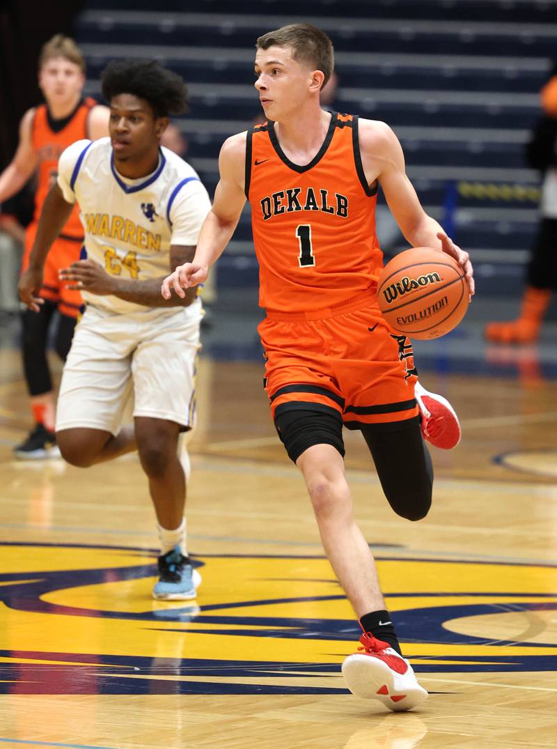 DeKalb’s Jackson Kees pushes the ball up court in front of Warren's Joshua Stewart Tuesday, Feb. 27, 2024, during their Class 4A sectional semifinal game at Rock Valley College in Rockford.