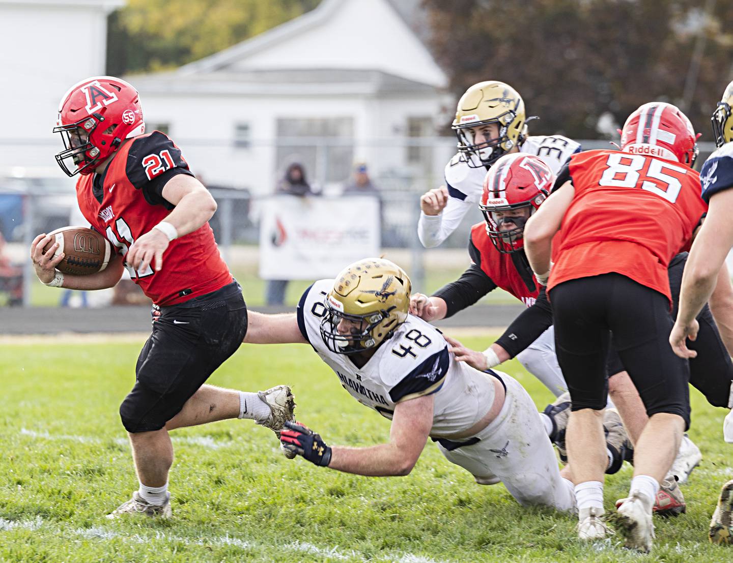 Amboy’s Quinn Leffelman picks up yards against Hiawatha Saturday, Oct. 28, 2023 in the I8FA playoffs in Amboy.