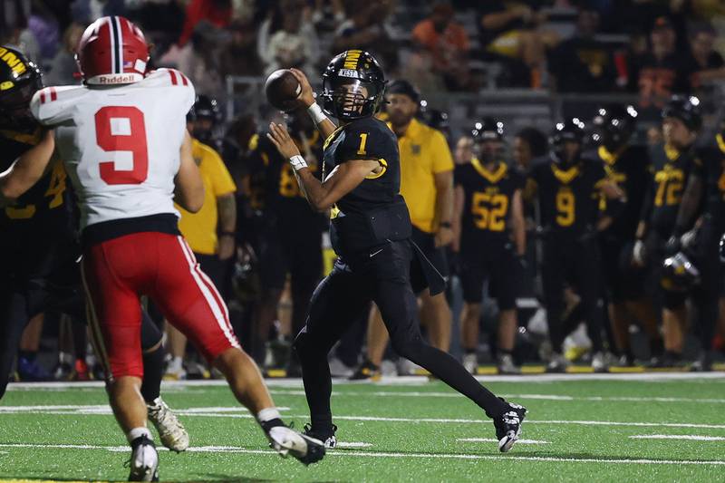 Joliet West’s Antoine Brooks looks to pass against Yorkville on Friday, Sept. 13, 2024 in Joliet.