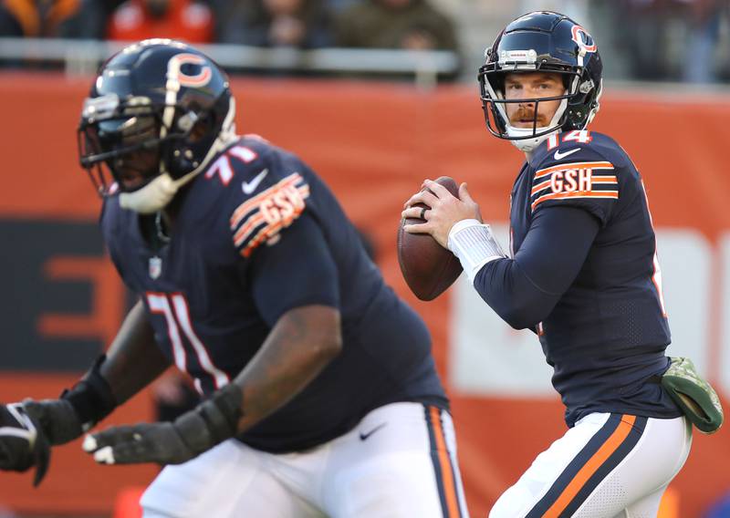 Chicago Bears quarterback Andy Dalton looks for a receiver during their game against the Baltimore Ravens Sunday, Nov. 22, 2021, at Soldier Field in Chicago.