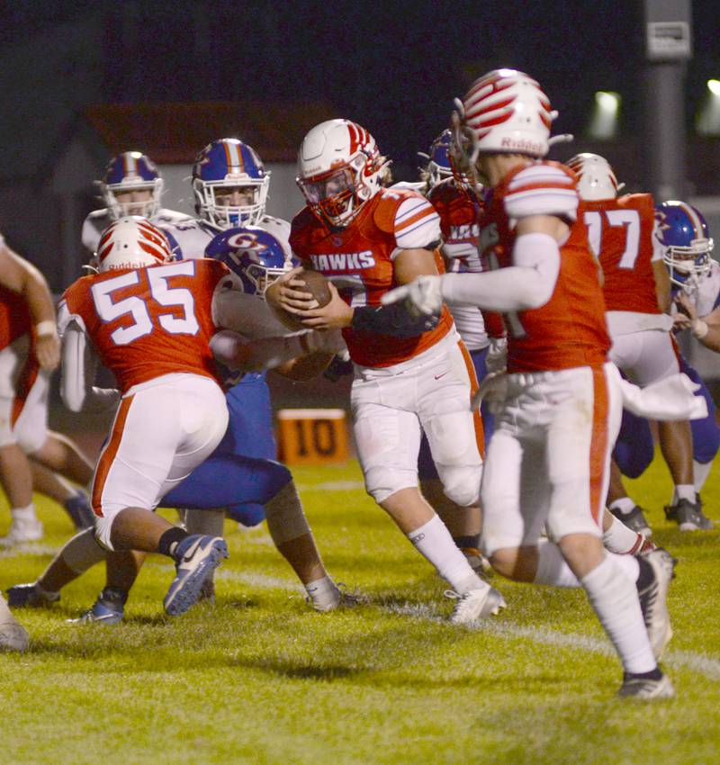 Oregon's Logan Weems (7) runs for yards against Genoa-Kingston on Friday, Sept. 13, 2024 at Landers-Loomis Field in Oregon.