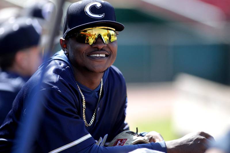 Kane County Cougars player Cornelius Randolph chats in the dugout during a practice at Northwestern Medicine Field in Geneva on Thursday, May 4, 2023. The Cougars’ season opens May 11.