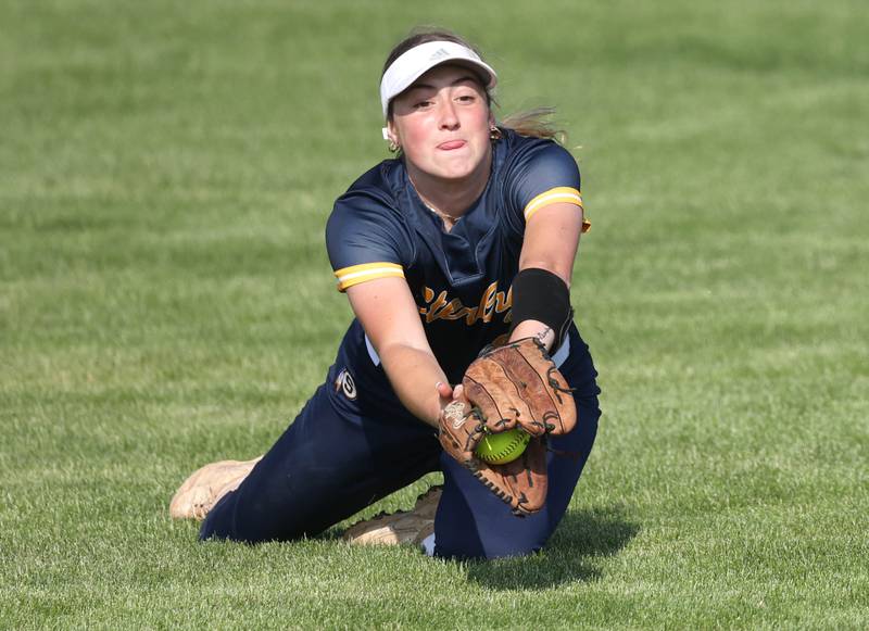 Sterling's Olivia Melcher makes a diving catch in center field during their game against Sycamore Tuesday, May 14, 2024, at Sycamore High School.