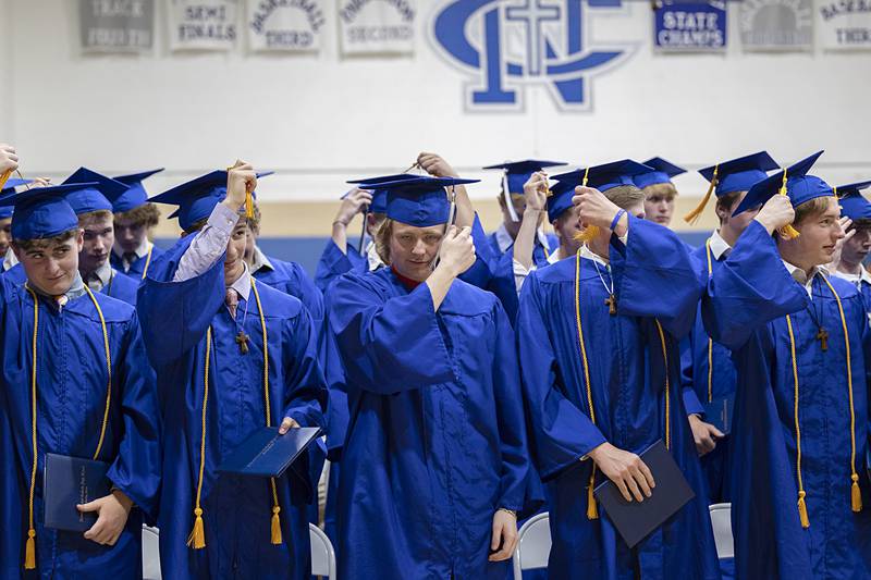 Newman grads flip their tassels Wednesday, May 15, 2024 at the end of commencement.