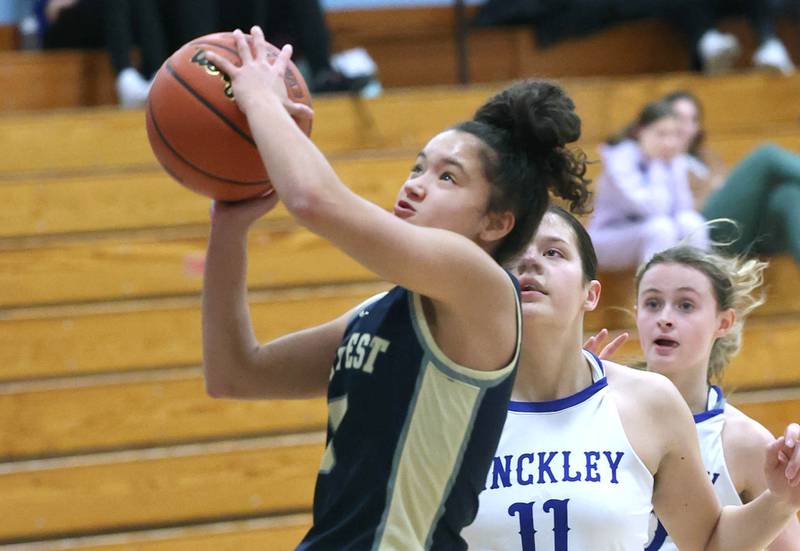 Harvest Christian’s Daphne Brown gets up a shot in front of Hinckley-Big Rock’s Raven Wagner Monday, Jan. 8, 2023, during their game at Hinckley-Big Rock High School.