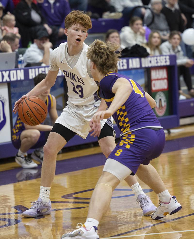 Dixon’s Austin Hicks works against Sherrard’s Carter Brown Thursday, Feb. 15, 2024 at Dixon High School.