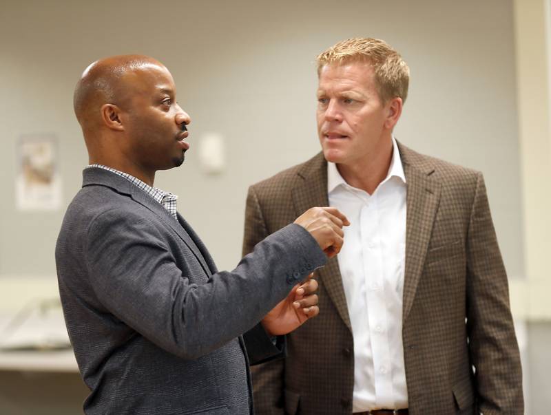 Principal Derick Edwards, left, speaks with D200 Superintendent Dr. Jeff Schuler at Johnson Elementary School Wednesday August 16, 2023 in Warrenville.