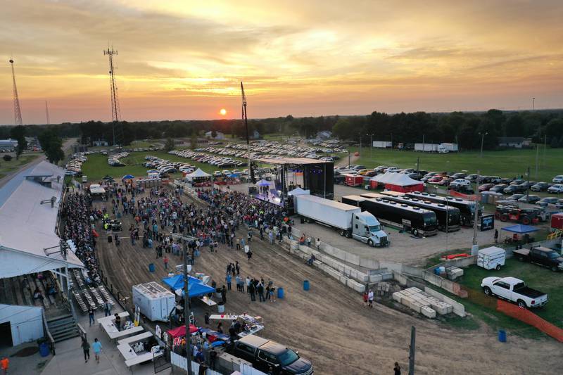 The sun sets as Lauren Alaina performs during the 169th Bureau County Fair on Thursday, Aug. 22, 2024 in Princeton.