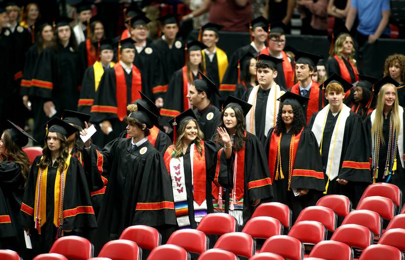 Batavia High School graduates enter the stadium during the school’s 2024 commencement ceremony at Northern Illinois University in DeKalb on Wednesday, May 22, 2024.