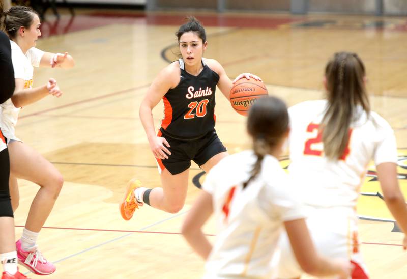 St. Charles East’s Alexis Maridis drives toward the basket during a Class 4A Batavia Sectional semifinal game against Batavia on Tuesday, Feb. 20, 2024.