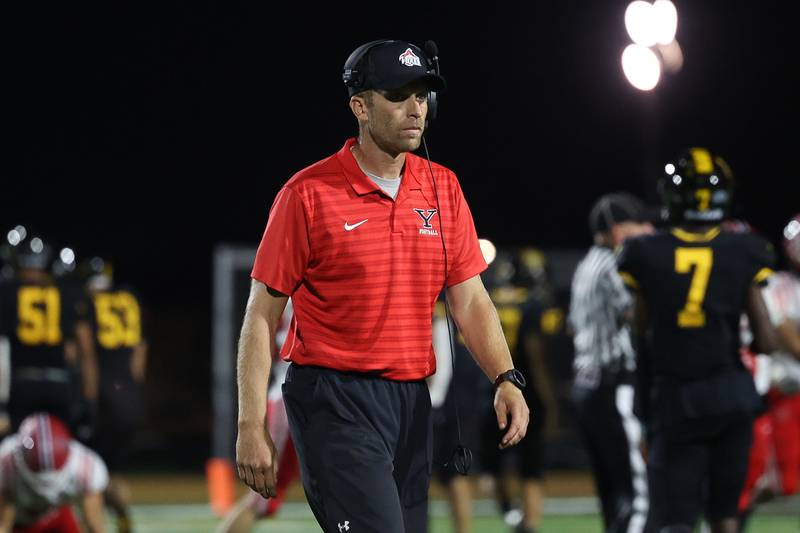 Yorkville head coach walks to the sidelines against Joliet West on Friday, Sept. 13, 2024 in Joliet.