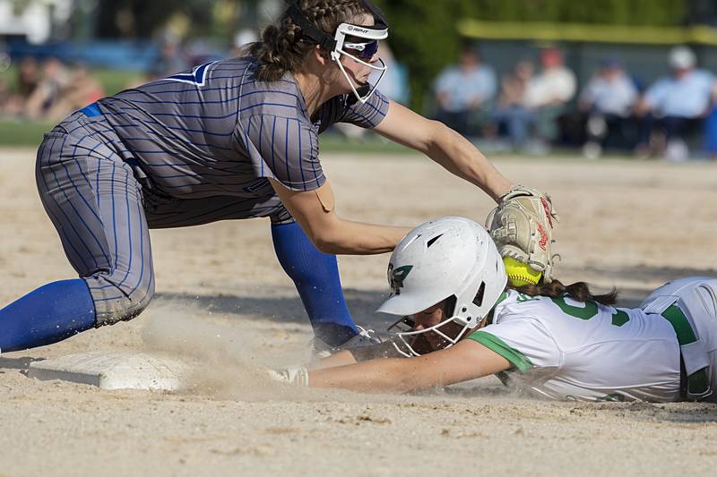 Rock Falls’s Maddison Morgan dives back to third against Princeton Wednesday, May 15, 2024 at the Class 2A regional softball semifinal.