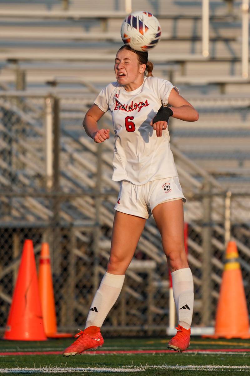 Batavia's Riley Bainter (8) heads the ball against St. Charles North during a Class 3A Batavia Regional final soccer match at Batavia High School in Batavia on Friday, May 17, 2024.