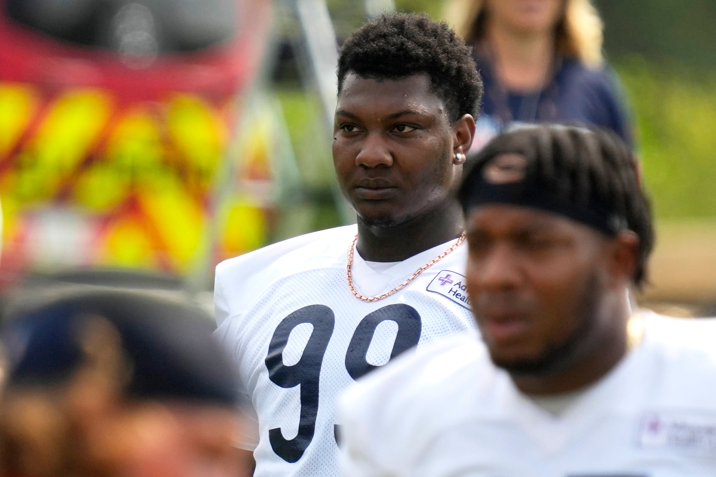 Chicago Bears defensive tackle Gervon Dexter Sr., (99) warms up during an NFL football training camp practice in Lake Forest, Ill., Tuesday, July 23, 2024. (AP Photo/Nam Y. Huh)