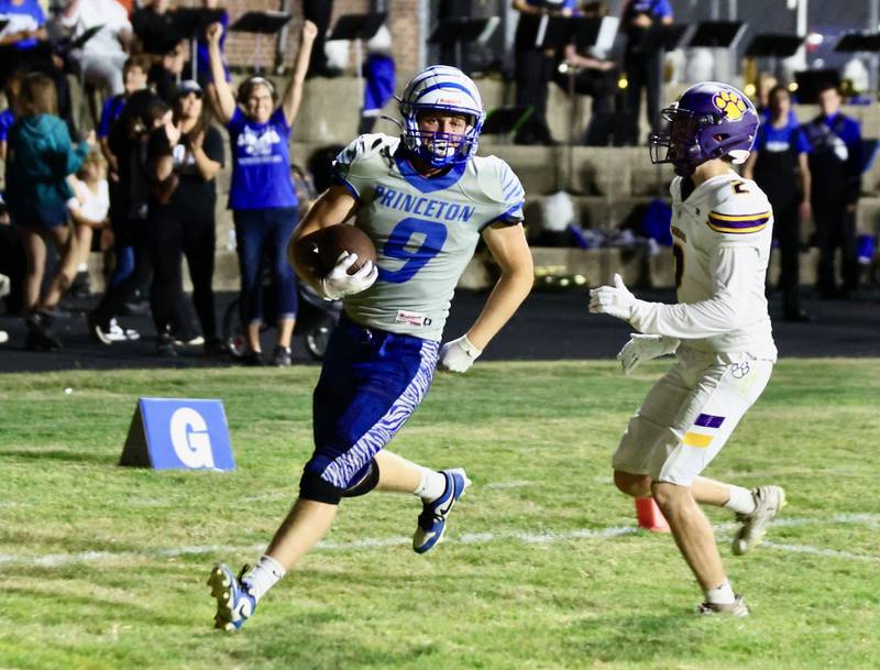 Princeton's Arthur Burden scores on a touchdown reception in Friday's game at Bryant Field. PHS won the battle of the Tigers 59-0.