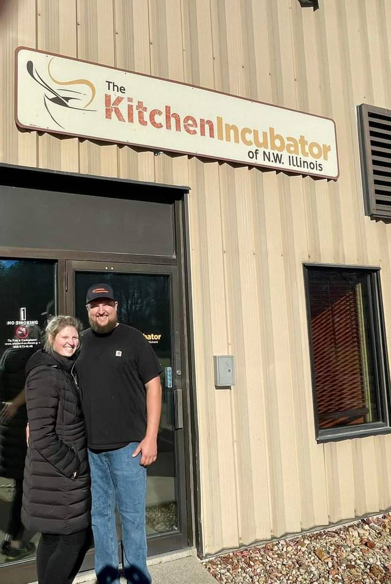 Devon Nicklaus and Emily Juist are shown outside of the Kitchenincubator of NW Illinois on Thanksgiving Day.