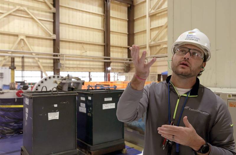 Kyle Entwistle, Turbine Services Manager, explains some of the workings of the Byron Generating Station Tuesday, Oct. 17, 2023, in Byron.