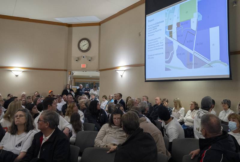 Residents listen to a presentation during a Planning and Zoning meeting at Crystal Lake City Hall on Wednesday, January 24, 2024. Crystal Lake trucking company NVA Transportation is seeking a rezoning of their Sands Road property to expand the business . Ryan Rayburn for Shaw Local