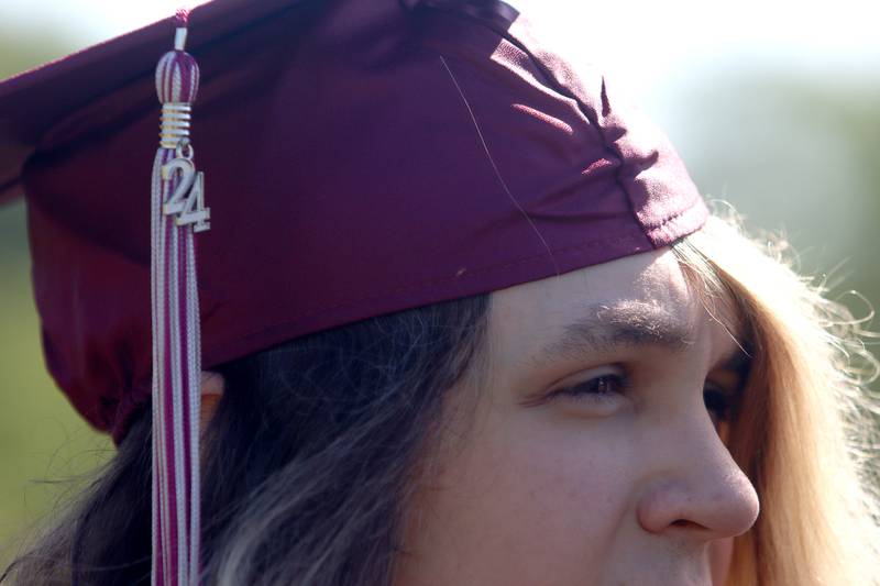 Rose Amburgey marches to Prairie Ridge High School’s commencement at the school in Crystal Lake on Saturday.