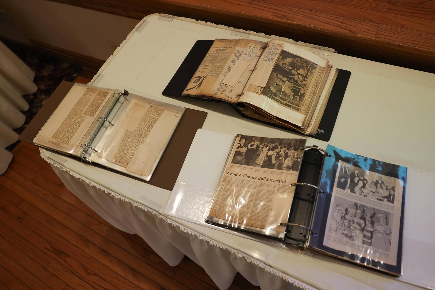 Several scrapbooks sit on a table at the Visitation and Aid Society of Joliet 135th birthday luncheon on Saturday, Sept. 7, 2024 in Joliet.