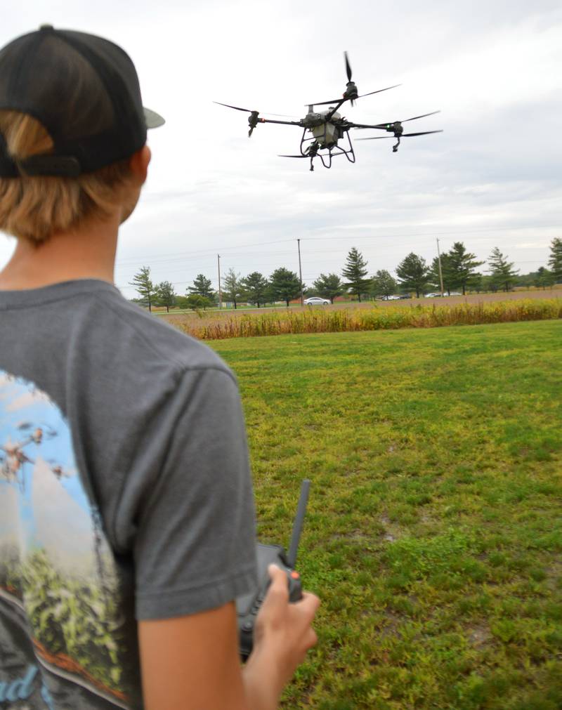 Illinois Valley Community College agriculture major Alex Jagers pilots a drone during a demonstration Friday, Sept. 22, 2023, at the annual Ag Field Day. As drone technology grows popular for such purposes as fungicide application, job opportunities in the field are expanding, too.