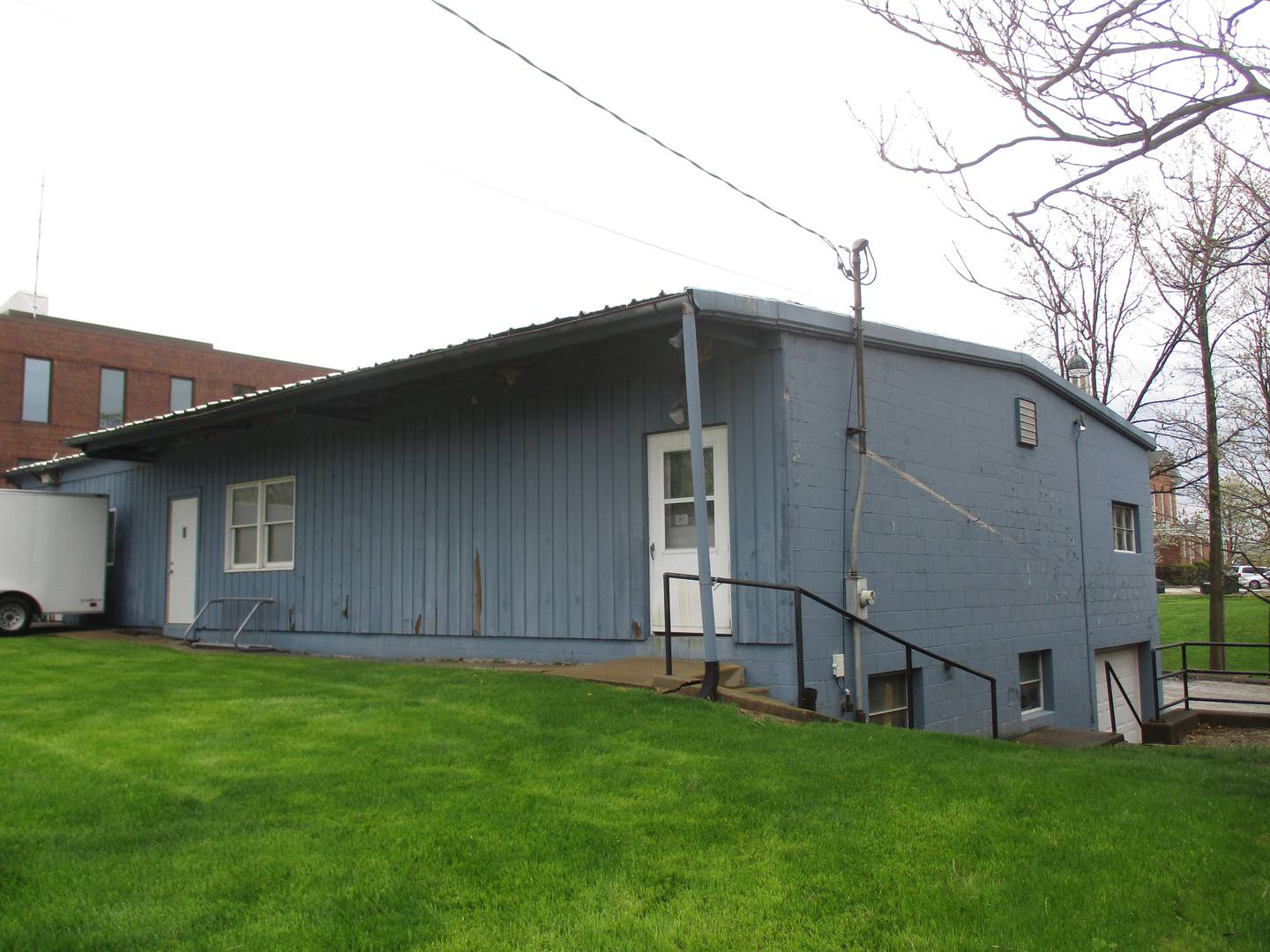 Kendall County will demolish this building at 105 W. Fox St. in Yorkville to make room for the expansion of the county's downtown campus. The structure is seen from its Fox Street frontage, with the Kendall County Office Building looming to the left.