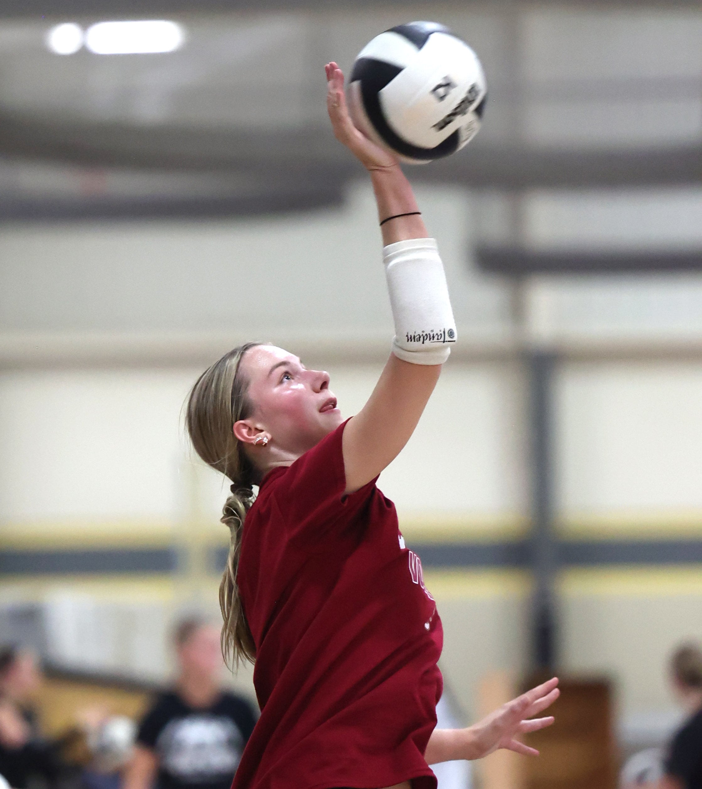 Ava Carpenter serves during a drill at Sycamore High School volleyball camp Tuesday, July 23, 2024, at Sycamore High School.