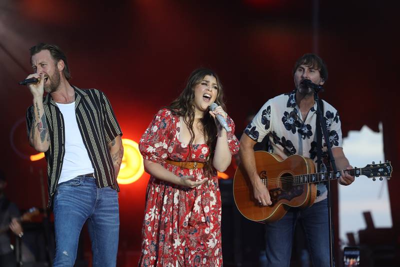 Charles Kelley, left, Hillary Scott and Dave Haywood of Lady A close out the night at the Taste of Joliet on Saturday, June 22, 2024 at Joliet Memorial Stadium.