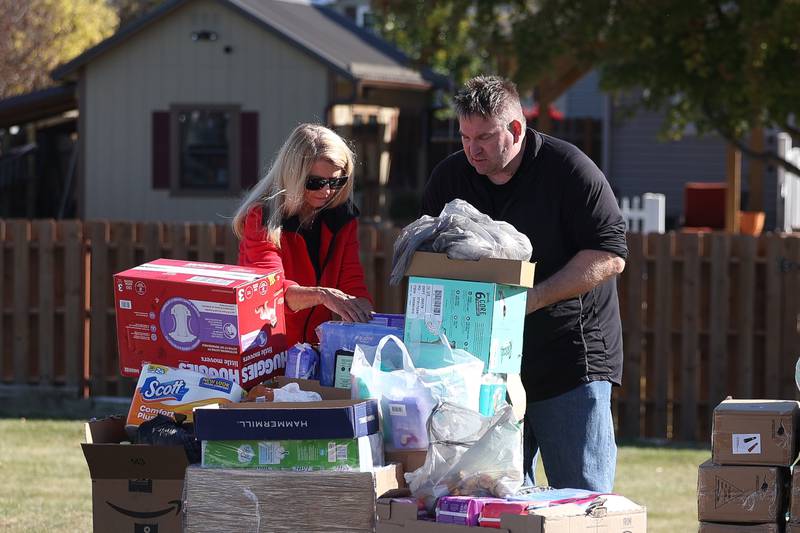 Joliet Councilwoman Jan Hallums Quillman and John Lukancic organize donations to be delivered to Bristol Motor Speedway, Tennessee for the victims of Hurricanes Helene and Milton at the City of Joliet and Cadence Cares Foundation relief drive on Saturday, Oct. 19, 2024 in Joliet.