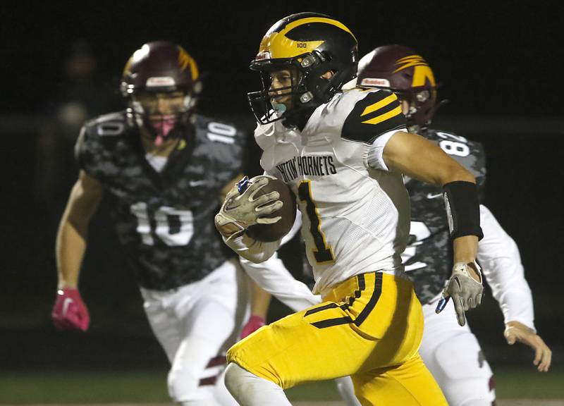 Harvard's Daniel Rosas returns the opening kick off during a Kishwaukee River Conference football game against Richmond-Burton on Thursday, Oct.12, 2023, at Richmond-Burton High School.