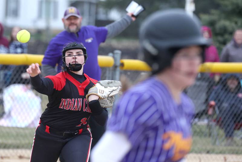 Indian Creek’s Emily Frazier throws out a Mendota baserunner during their game Thursday, March 14, 2024, at Indian Creek High School in Shabbona.