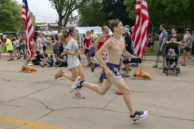 Runners eye the finish line Saturday, July 1, 2023 for the 23rd annual Reagan Run in Dixon.