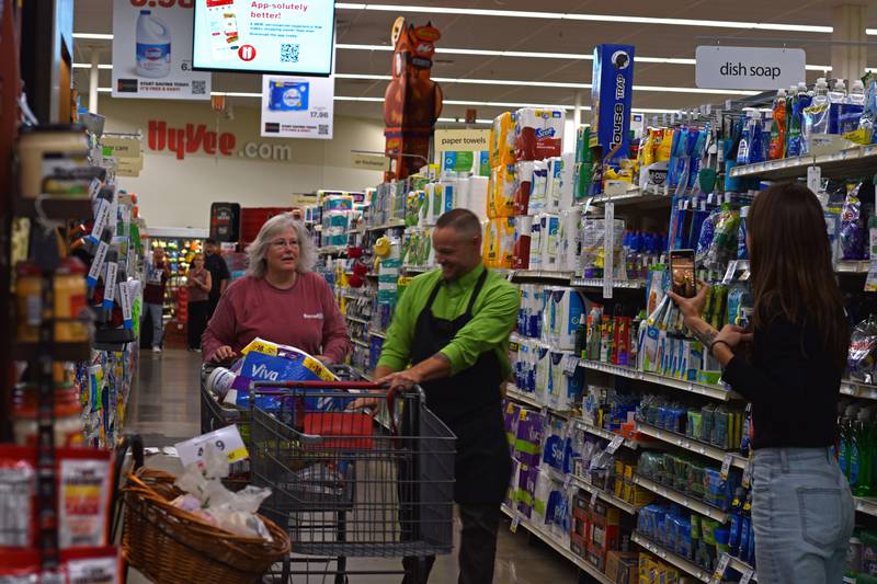 Hometown Hero grand prize winner Dana VanAutreve finishes her two-minute Peru HyVee shopping spree.