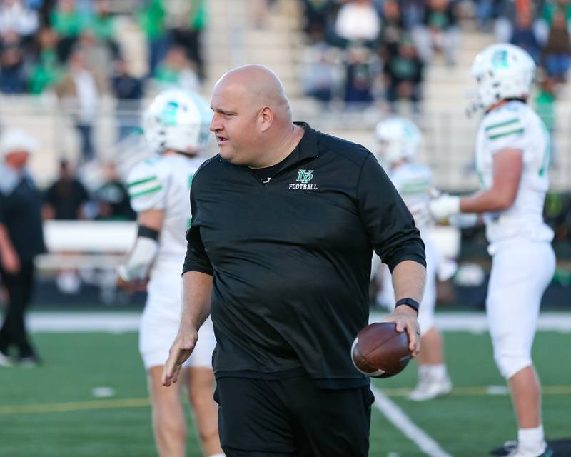 York head coach Donald Gelsomino hypes up the team during drills before a football game between York at Plainfield North on Friday, Sept 6th, 2024 in Plainfield. Gary E Duncan Sr for Shaw Local News Network.