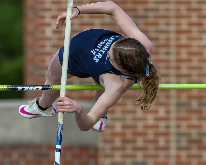 Downers South's Kailee Rodeck competes in the pole vault at the Downers Grove North Regional Girls Track and Field meet.  May 10, 2024