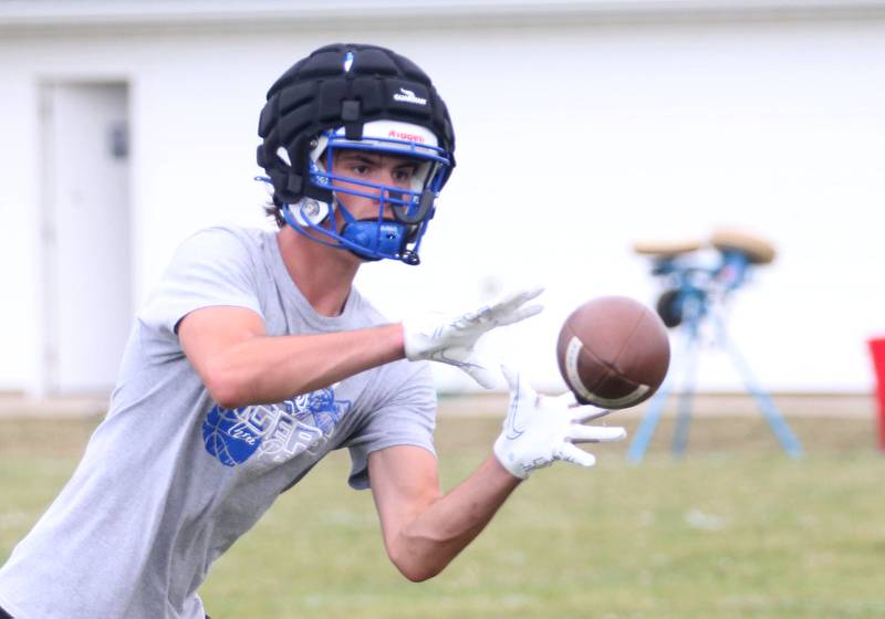 Princeton's Noah LaPorte catches a pass during the first day of football practice on Monday, Aug. 12, 2024 at Little Siberia Field in Princeton.