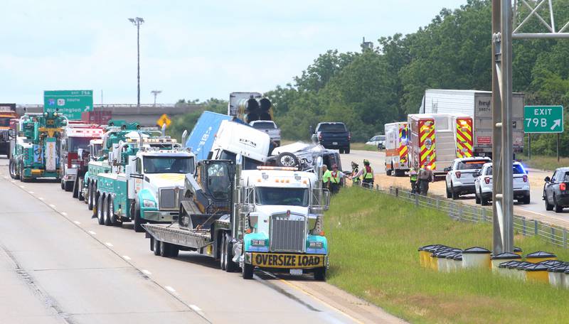 Crews work the scene of a multiple semi truck crash in the eastbound lane of Interstate 80 near the Interstate 39 interchange on Tuesday, May 28, 2024 near Utica. La Salle and Utica Fire and EMS along with Illinois State Police responded to the accident around 12:20p.m. on Interstate 80. Multiple patients were transported to area hospitals.