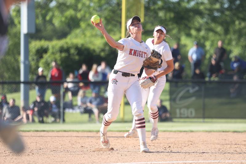 Lincoln-Way Central’s Mia Guide makes a throw to first for the out against Lincoln-Way East in the Class 4A Lincoln-Way Central Sectional semifinal on Wednesday, May 29, 2024 in New Lenox.