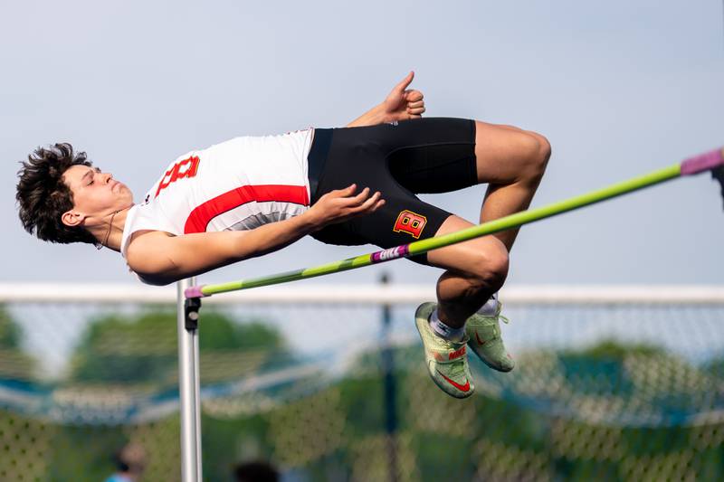 Batavia’s Alec Crum competes in the long jump during a DuKane Conference boys track and field meet at Geneva High School on Thursday, May 11, 2023.