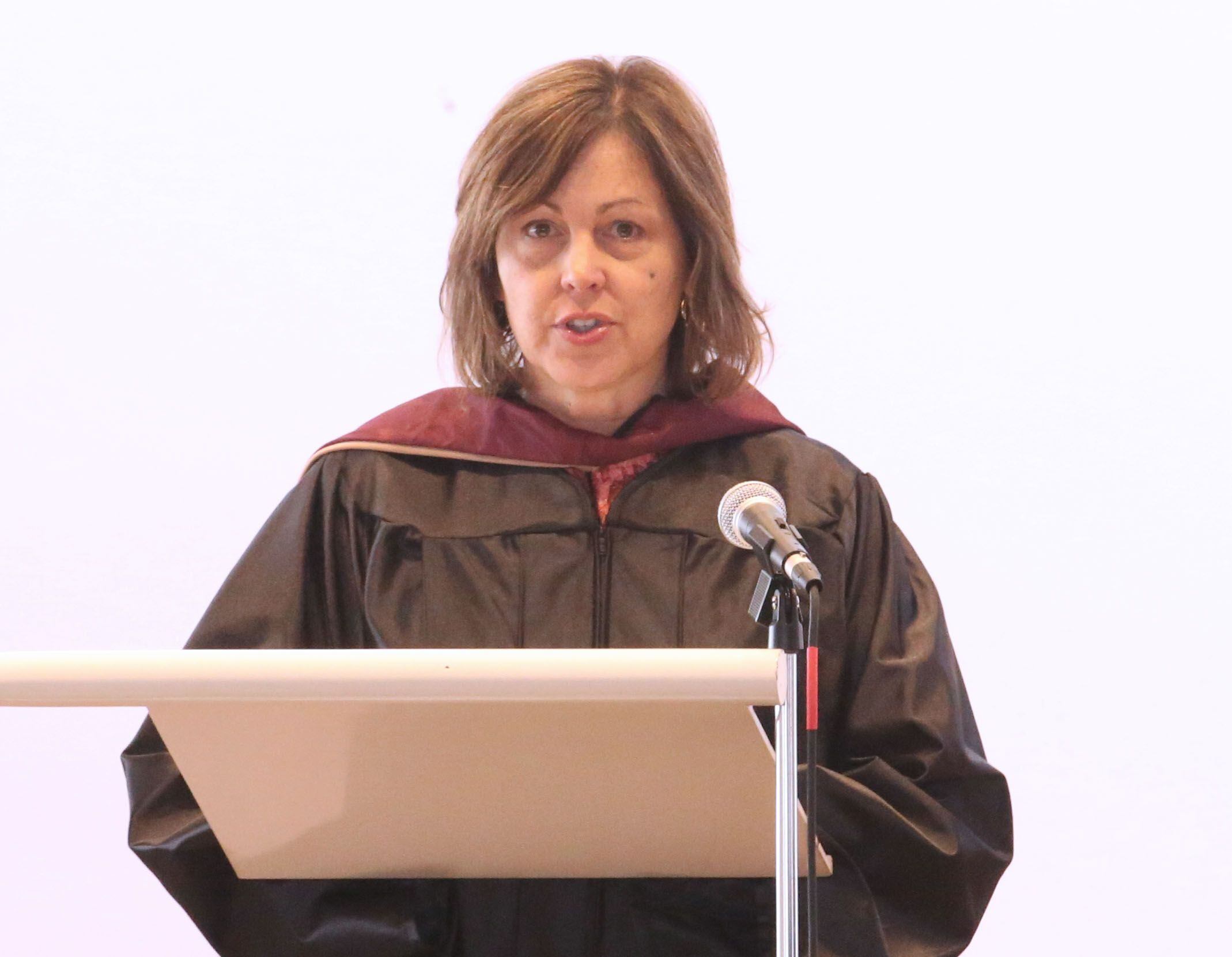 St. Bede Academy Superintendent Eve Postula delivers a speech during the Class of 2023 graduation ceremony on Sunday, May 21, 2023, in the Abbey Church at the academy.