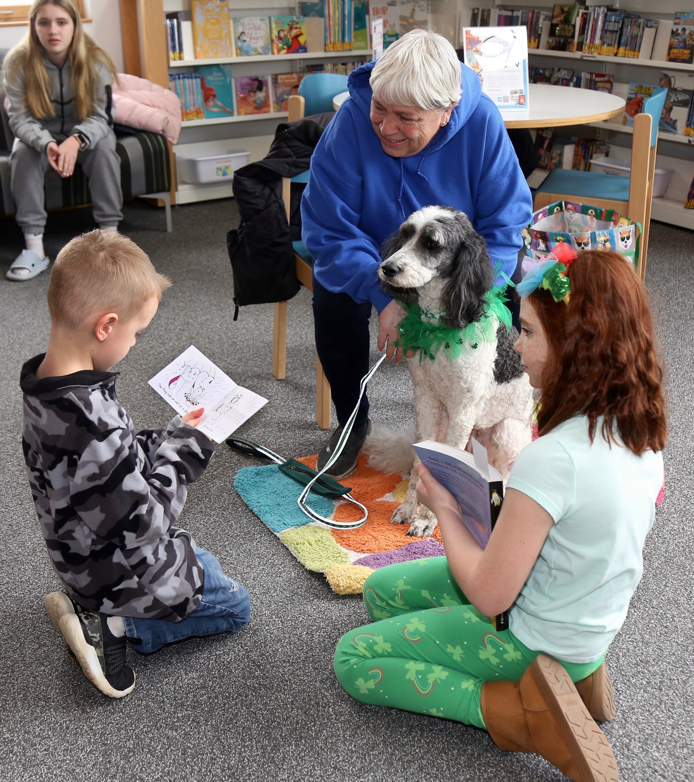 Kids can read to therapy dogs at Yorkville Library program