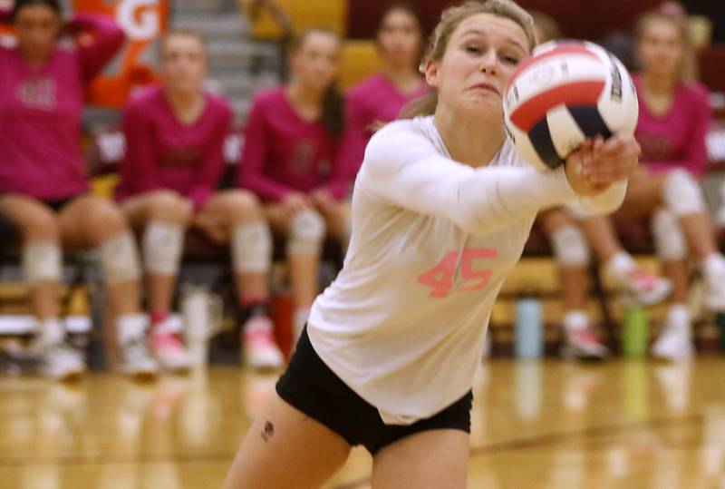 Richmond-Burton's Lanee Cooley bumps the ball during a Kishwaukee River Conference volleyball match against Woodstock North Wednesday, Oct.11, 2023, at Richmond-Burton Community High School.