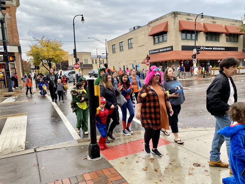 Costume-clad families took downtown DeKalb by storm Thursday, Oct. 26, 2023 for the 26th annual Spooktacular trick-or-treating event hosted by the DeKalb Chamber of Commerce.