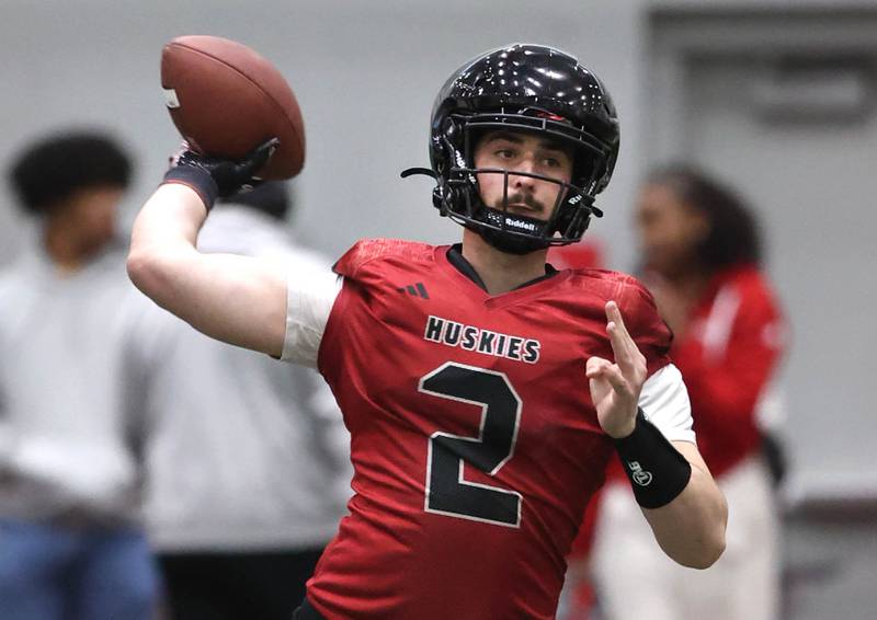 Northern Illinois University quarterback Ethan Hampton throws a pass Tuesday, March 26, 2024, during spring practice in the Chessick Practice Center at NIU.