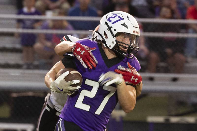 Dixon’s Eli Davison catches a pass over the middle against Stillman Valley Friday, Aug. 30, 2024 at Dixon High School.