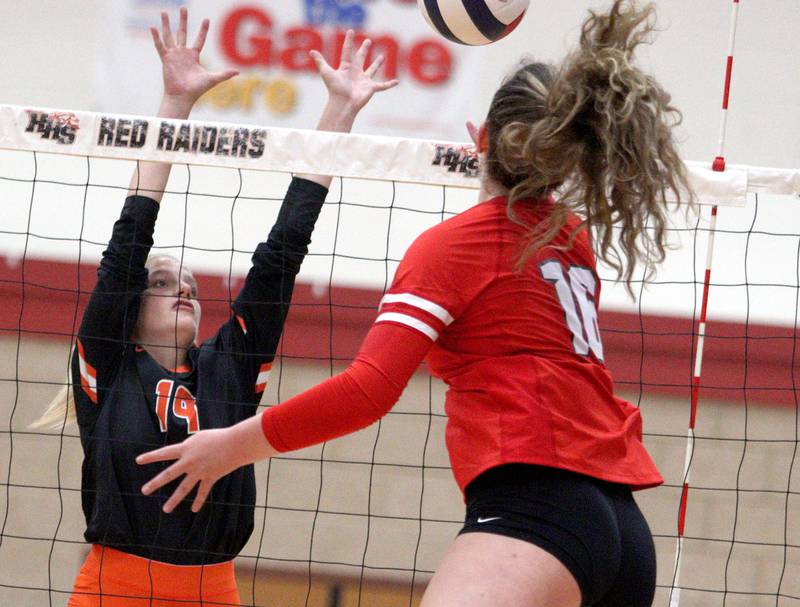 Crystal Lake Central’s Alexis Hadeler, left, and  Huntley’s Georgia Watson battle at the net during a Fox Valley Conference volleyball match on Tuesday, Aug. 27, 2024, at Huntley High School.