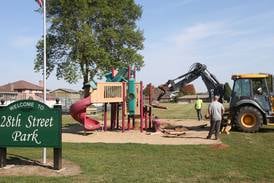 Photos: Crews replace playground, lighting at city parks in Peru