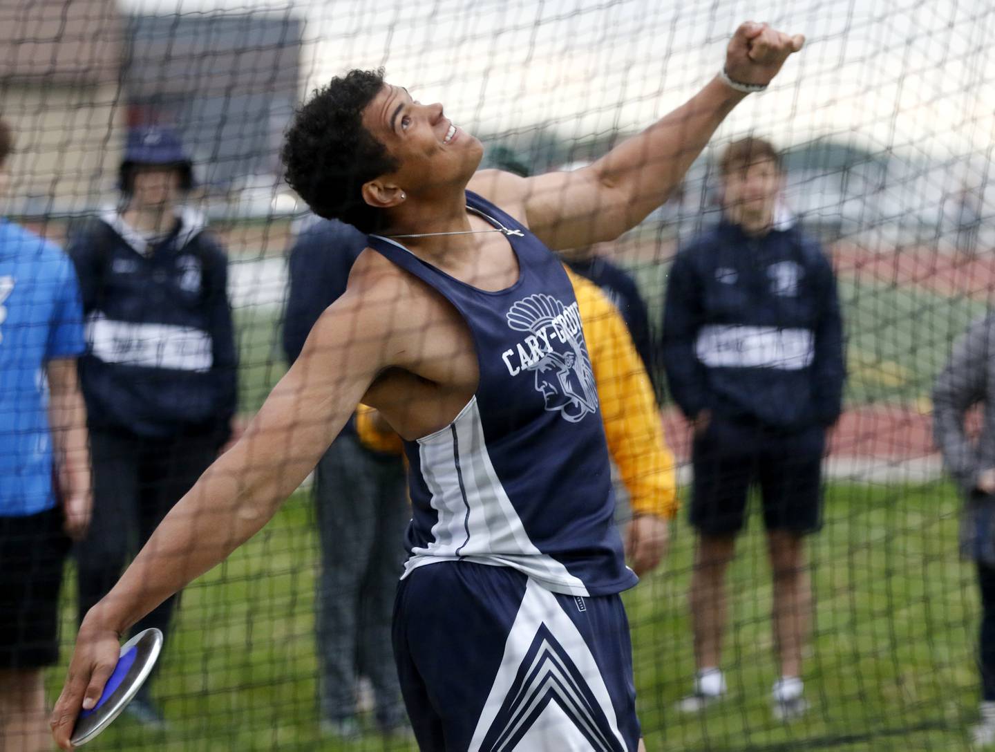 Cary-Grove’s Reece Ihenacho throws the discus during the Fox Valley Conference Boys Track and Field Meet on Thursday, May 9, 2024, at Huntley High School.