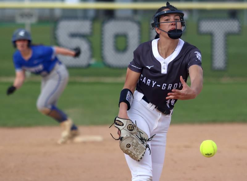 Cary-Grove’s Addy Green delivers against Burlington Central in varsity softball at Cary Monday.