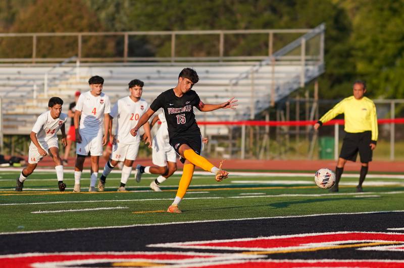 Yorkville's Mizael Terrazas (15) scores a goal off a penalty kick against Oswego during a soccer match at Yorkville High School on Tuesday, Sep 17, 2024.